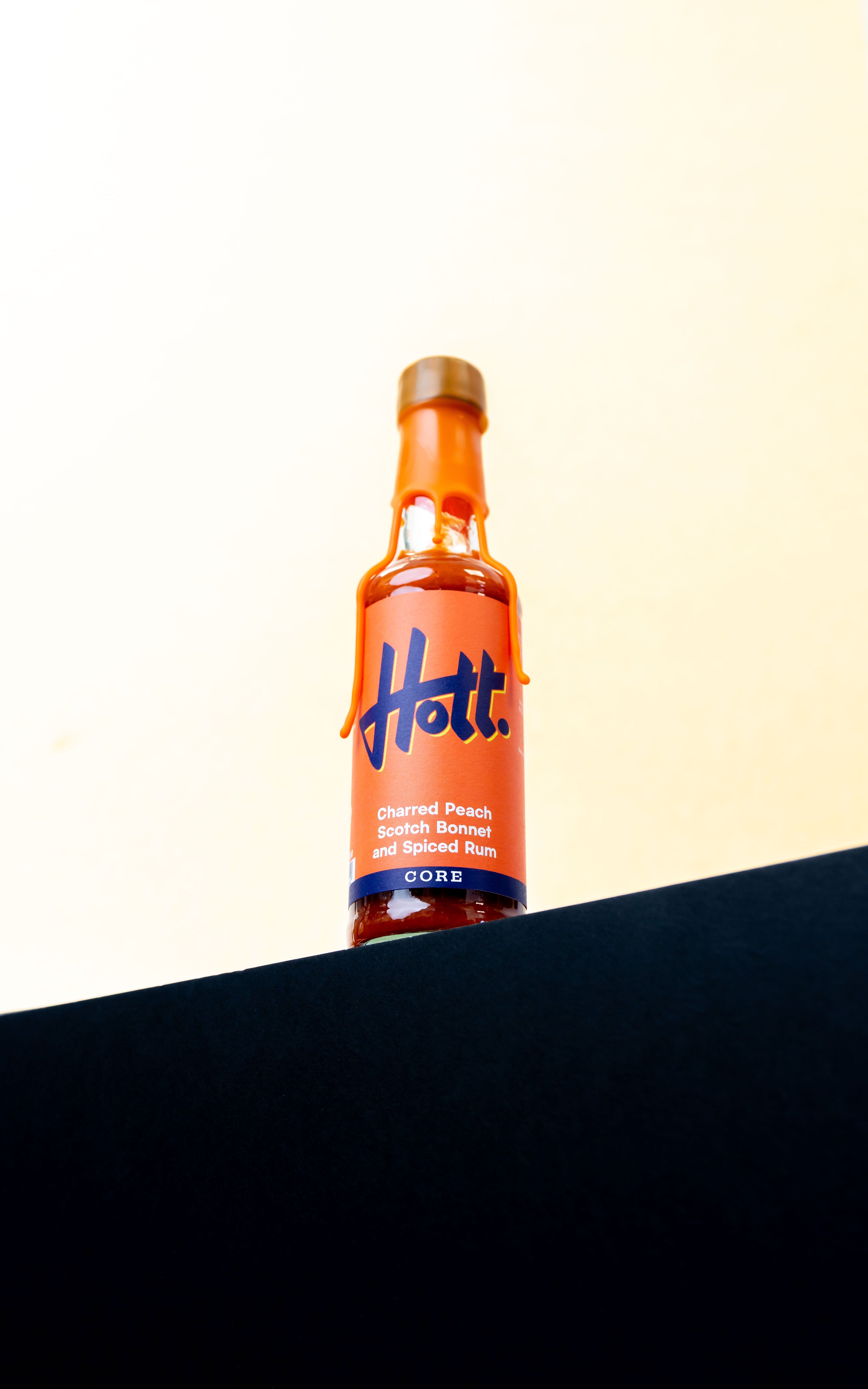 Charred Peach, Scotch Bonnet and Spiced Rum Hott Sauce