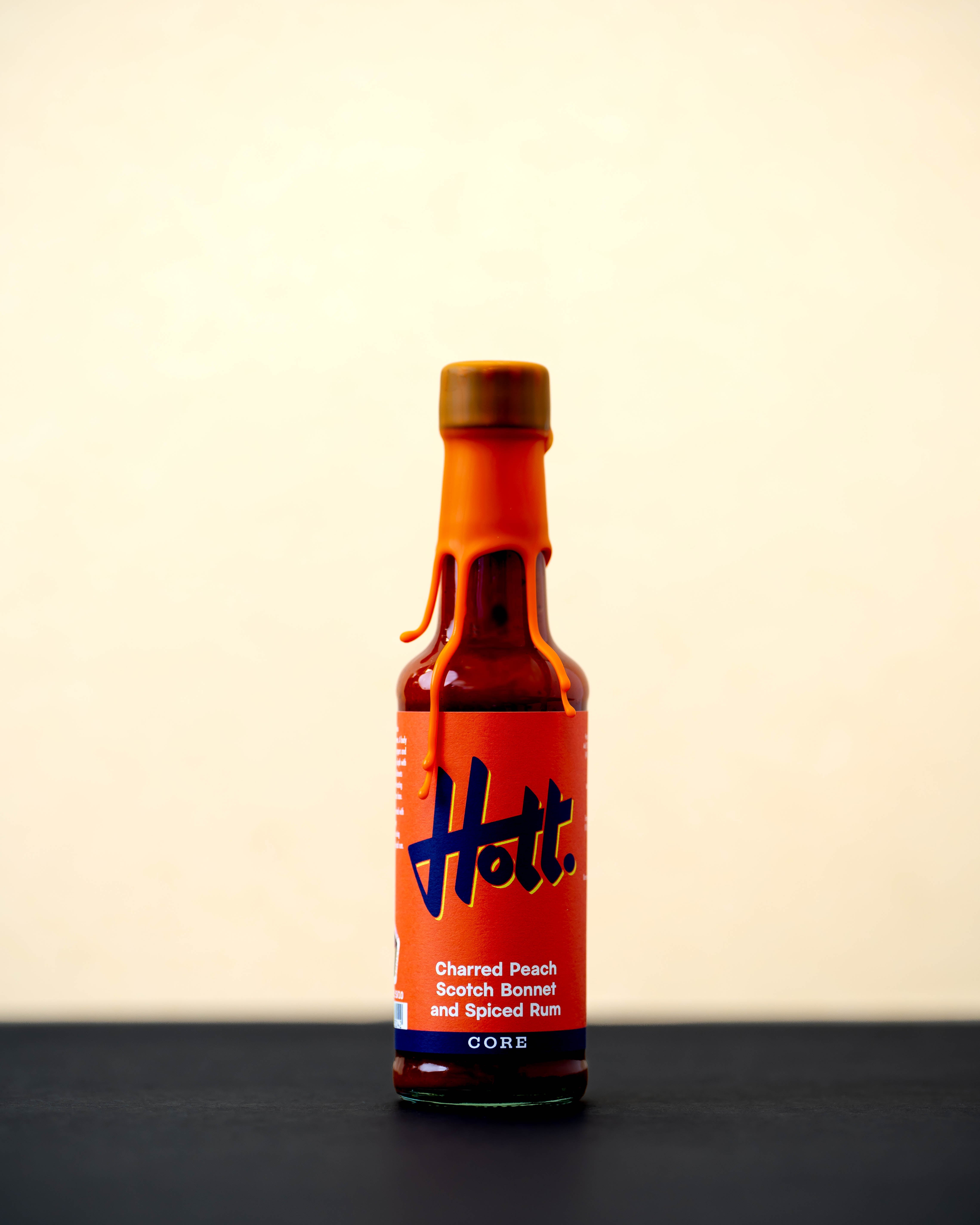 Charred Peach, Scotch Bonnet and Spiced Rum Hott Sauce